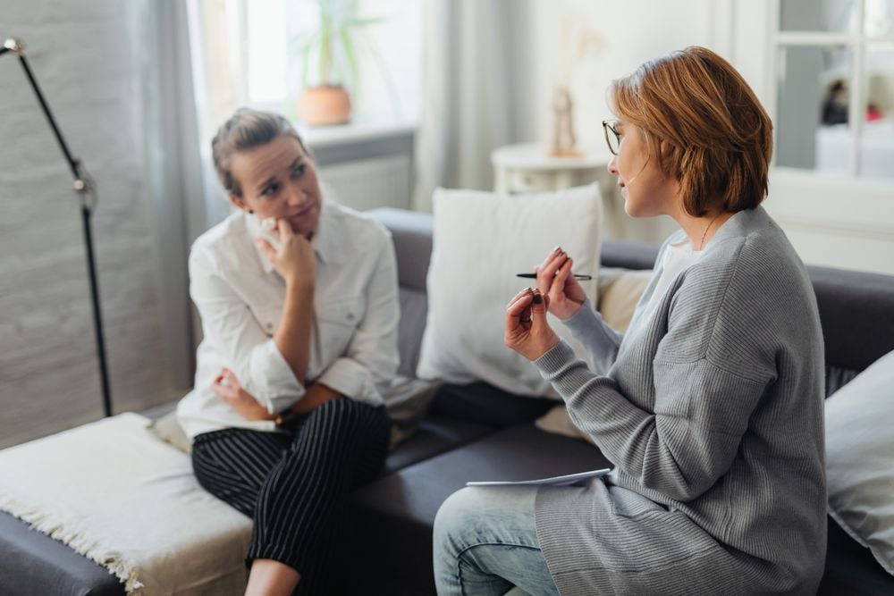 Therapist and client talking in a Louisville, Kentucky counseling office